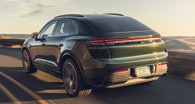 Porsche Macan Electric Turbo driving, rear