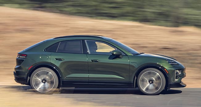 Porsche Macan Electric Turbo driving, side