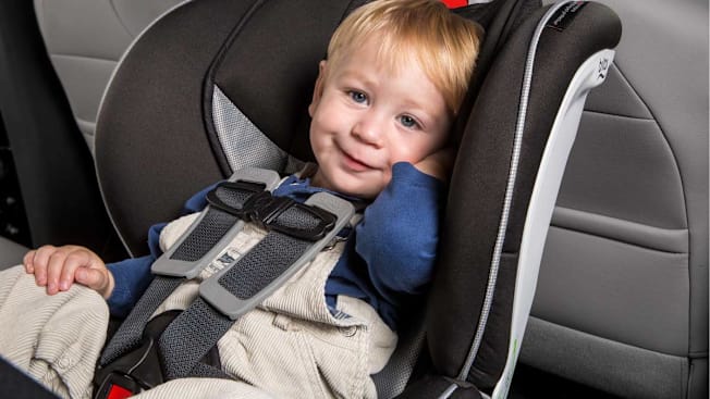 A 1 to 2 year old in rear-facing convertible or all-in-one car seat.