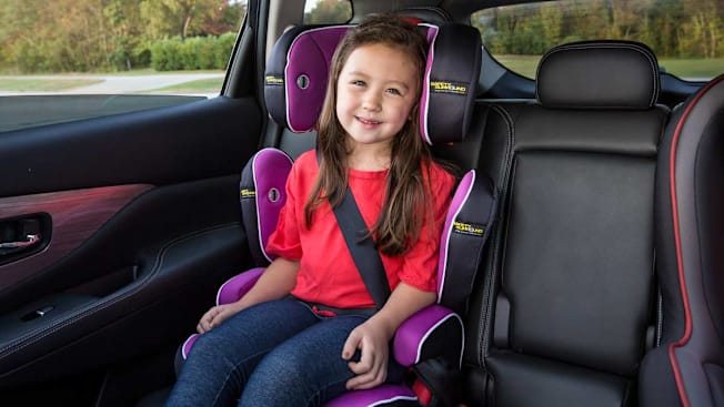 A 7-8 year old in forward-facing belt-positioning booster seat.