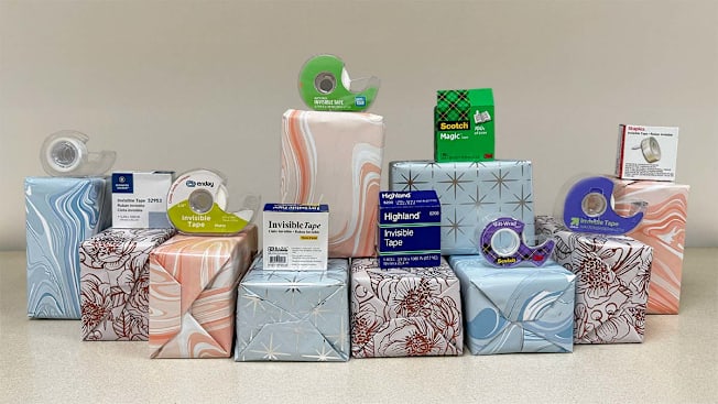 Wrapped gifts with tapes and tape dispensers