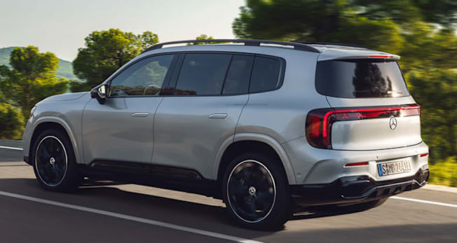 2027 Mercedes-Benz GLB hybrid driving, viewed from the rear