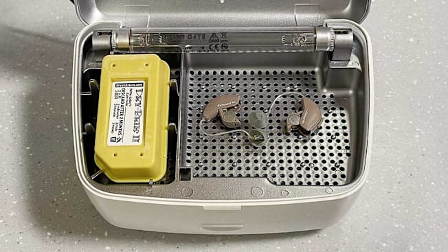 close up of open Global II by Dry & Store | Electric Hearing Aid Dehumidifier with UV-C Lamp Sanitizer with hearing aids