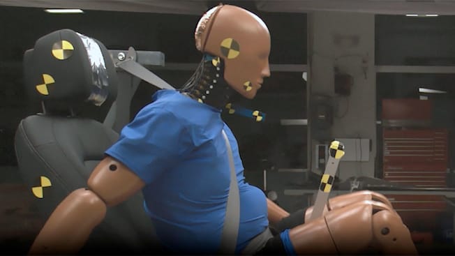 Dummy shown during whiplash testing by IIHS