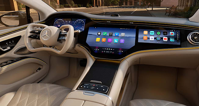 2027 Mercedes-Benz EQS interior showing screens and yoke steering wheel