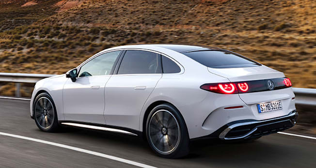2027 Mercedes-Benz C-Class electric driving, shown from rear