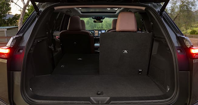 2027 Lexus TZ cargo area with one seat folded