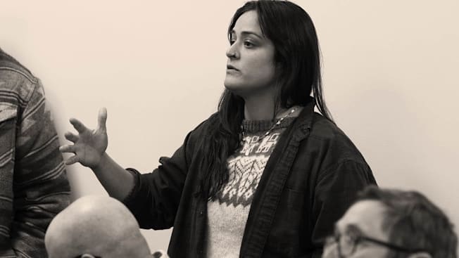 Woman at local hearing (Sam Alba)