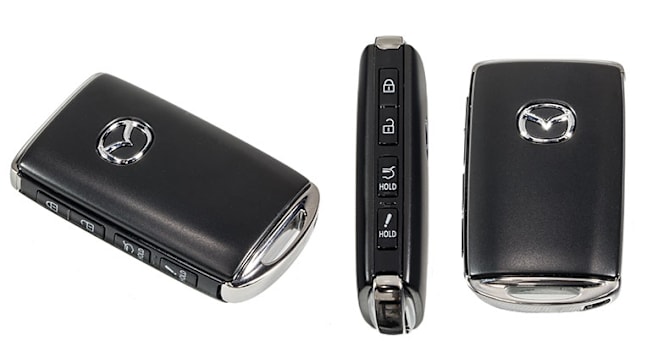 Mazda key fob from three different angles