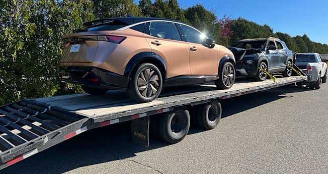 Nissan Ariya shipped via car hauler.