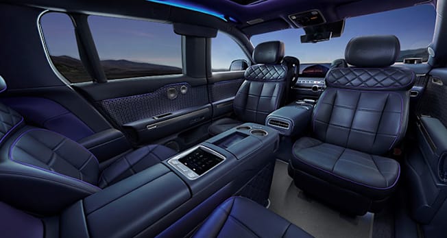 2027 Genesis GV90 Neolun electric SUV cabin showing seats turned around