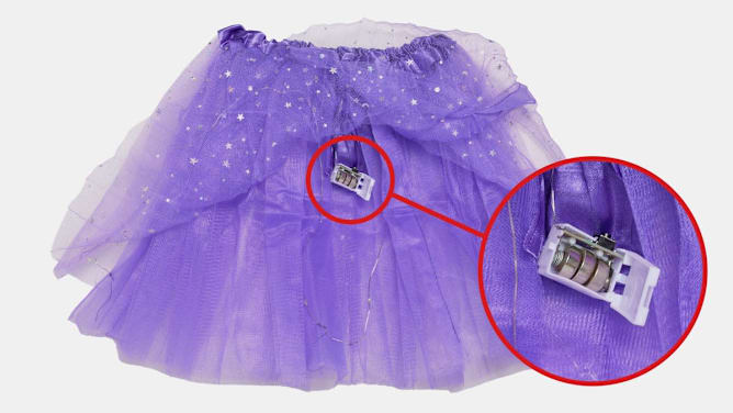Zeyue LTD Light Up Tutu Skirt with circle enlarging a detail photo showing the open battery compartment