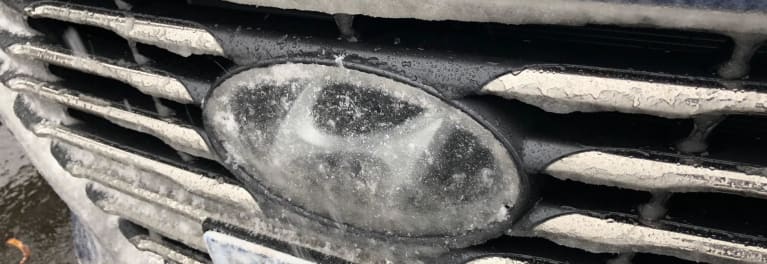 Hyundai Sonata grille covered in ice.