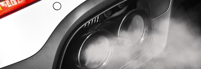 A photo of tail-pipe emissions. Consumer Reports' second Consumer Voices Survey finds Americans increasingly lack confidence that the government will hold automakers accountable.  
