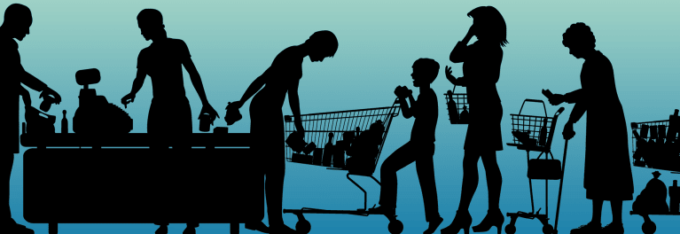People holding baskets of goods, waiting on a grocery store line. 