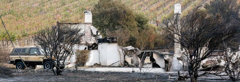 A white structure destroyed by a natural disaster.