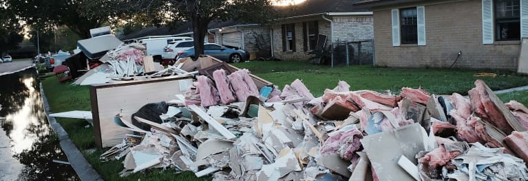 Houses and debris after a hurricane. 