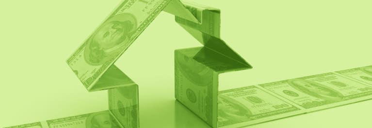 An illustration of a house made of money
