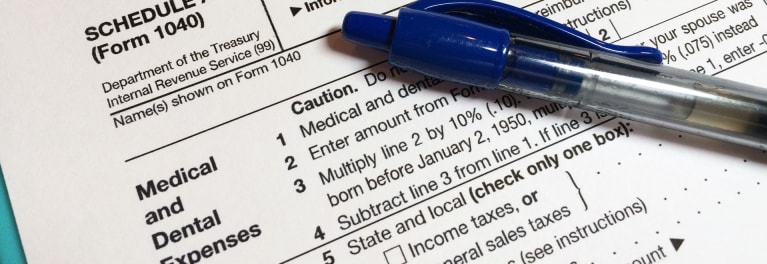 This is a photo of a tax form. It's important to consider medical tax deductions before filing taxes. 