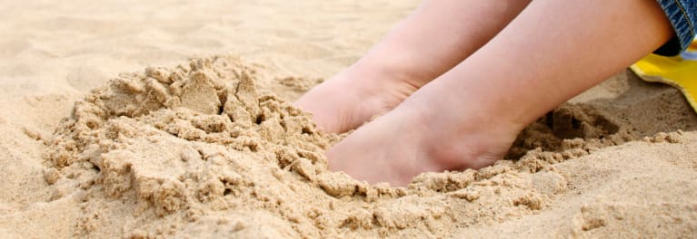 Toes in sand. New drugs to treat toenail fungus work, but simpler solutions sometimes are enough. 